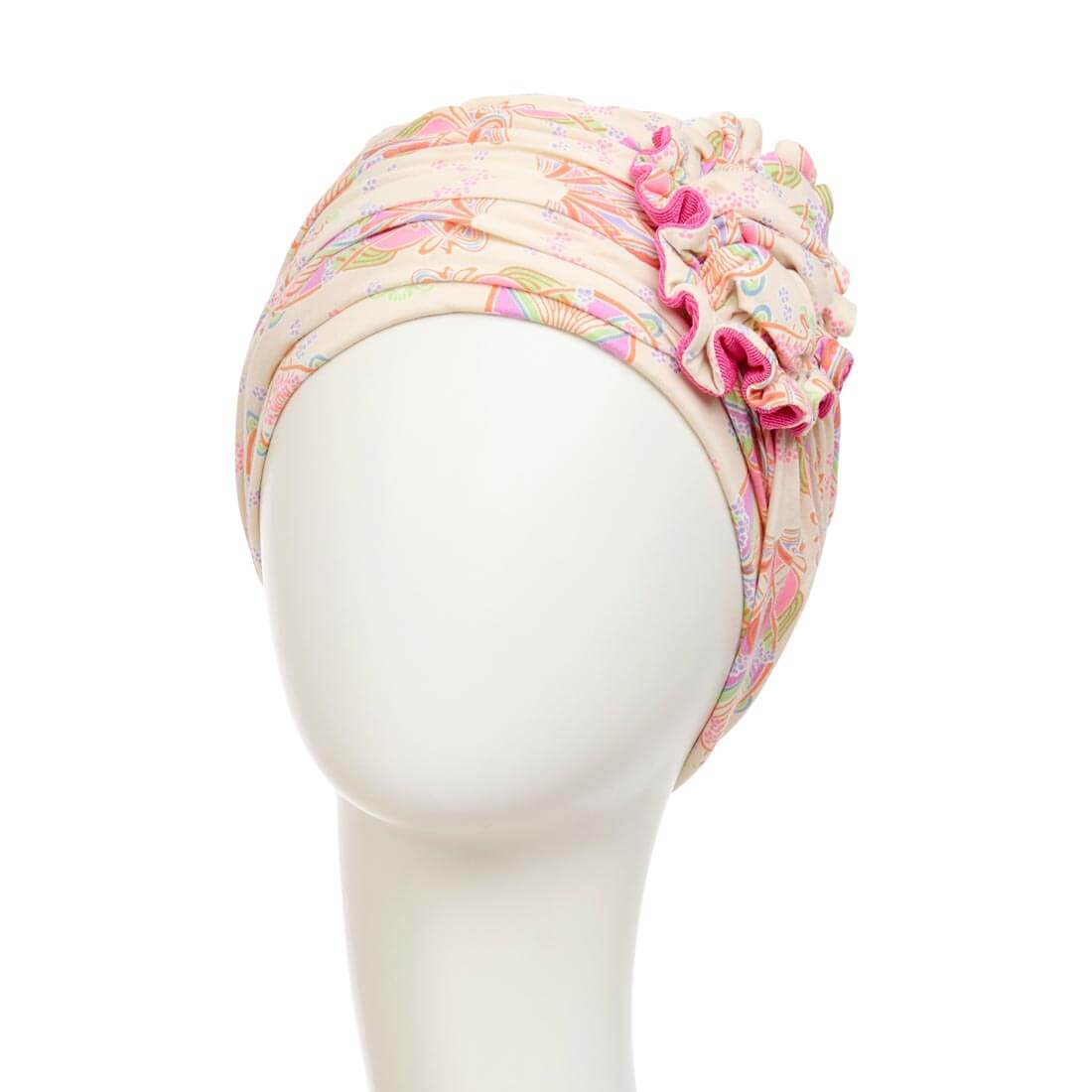Feminin turban med en stor blomst til kvinder med hårtab