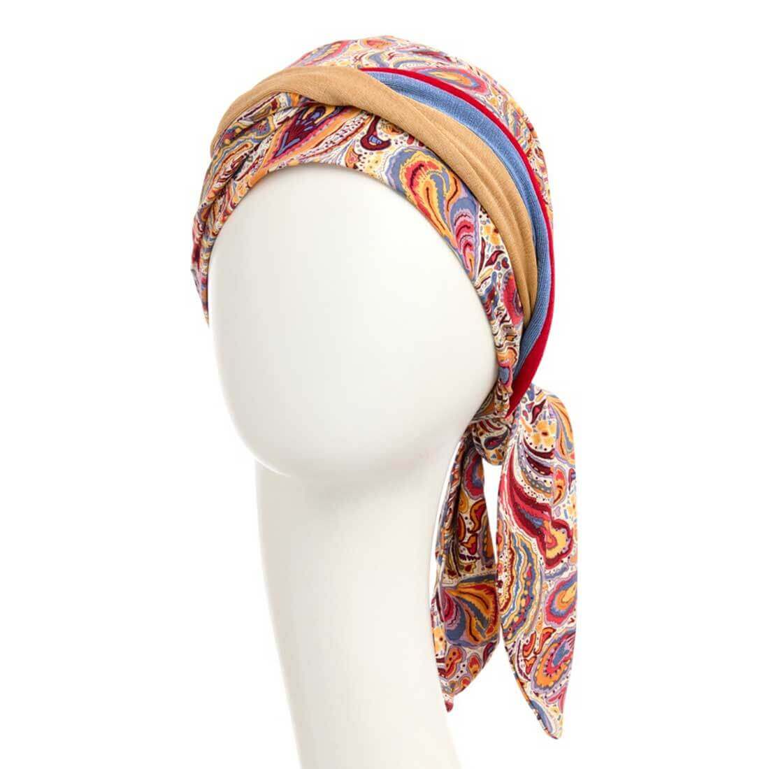 Farverig turban tørklæde til håret, med påsyet pandebånd og bindebånd for et utal af stylingmuligheder.