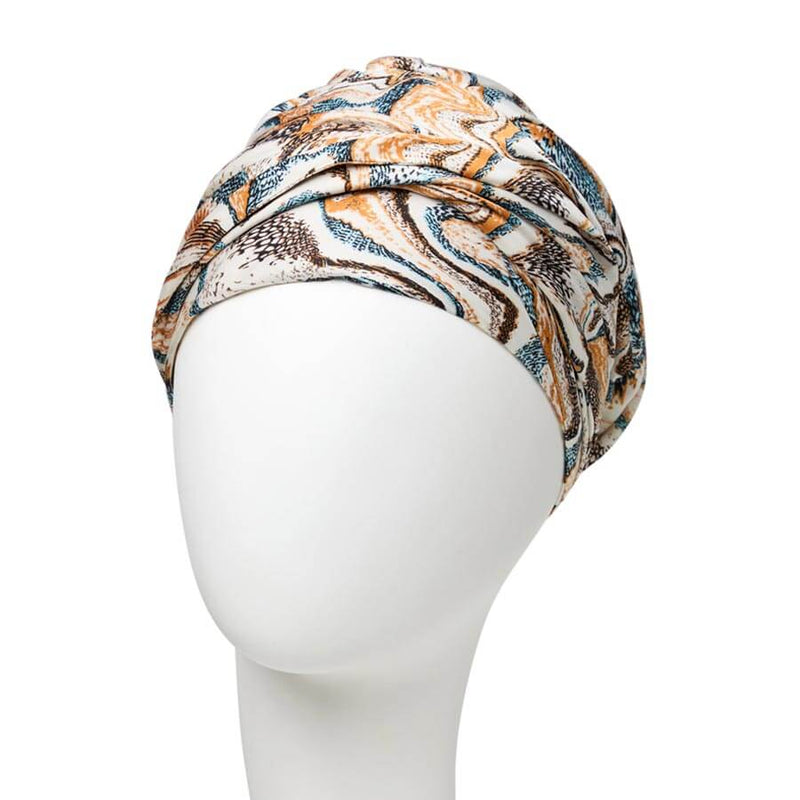 Sapphire Turban med smukt mønster og pandebånd der giver fylde.