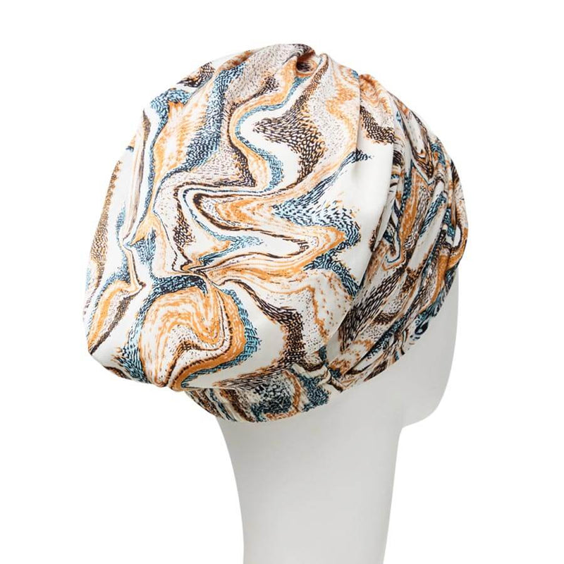 Sapphire Turban med smukt mønster og pandebånd der giver fylde.