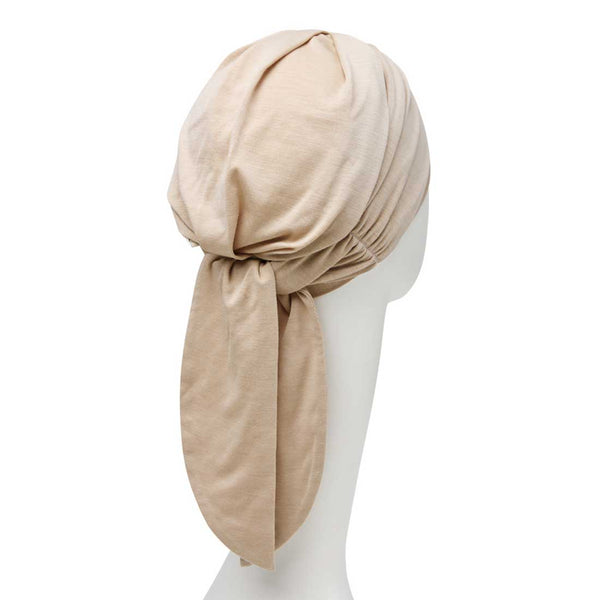 B.B. Beatrice turban med bindebånd i nakken.