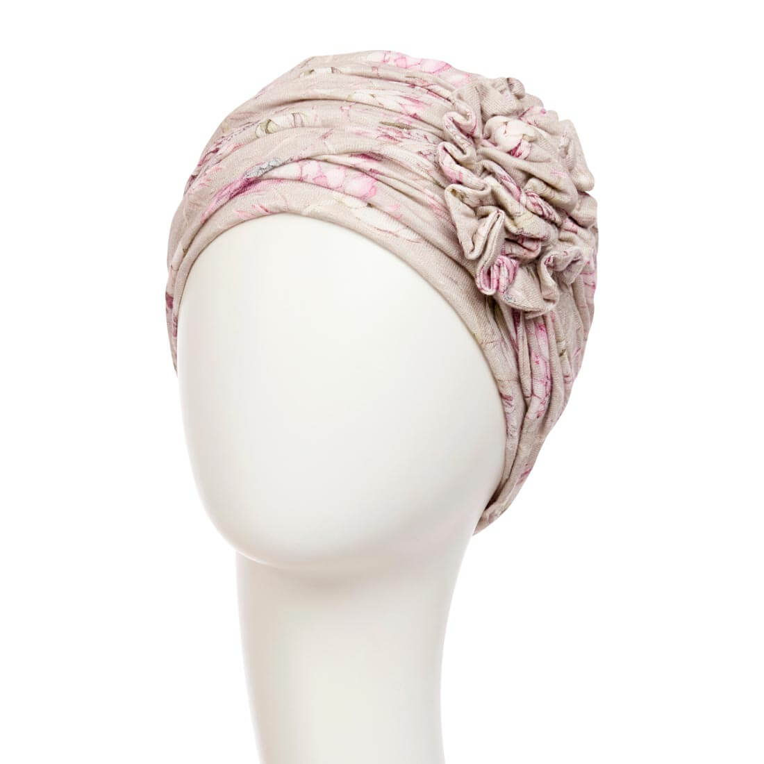 Feminin turban hue med draperinger for flot fylde