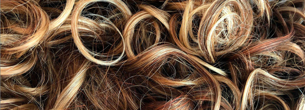 Smukt krøllet hår, der er doneret til Toftilds Love is in the Hair projekt