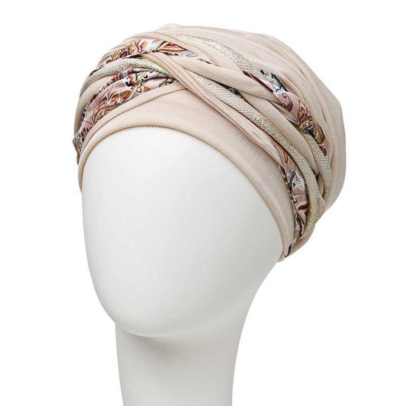 Smuk feminin turban med et aftageligt pandebånd i forskellige mønstre.